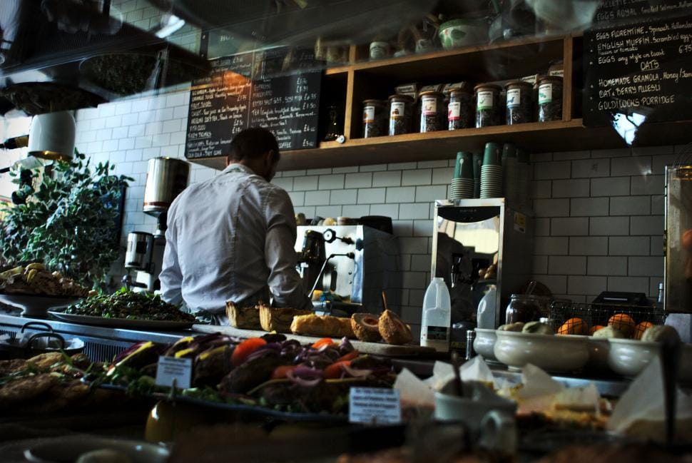 Chef preparing food in a modern restaurant kitchen